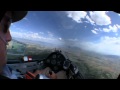 Glider flying in heavy turbulence over Utah mountains