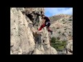 Cleaning climbing routes from loose rocks, slow motion.