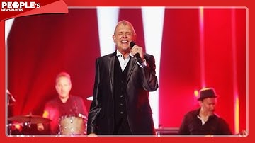 John Farnham stable following surgery to remove a tumour in his mouth