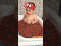 The Cute Baby Eating Strawberry And Bathing In Strawberry