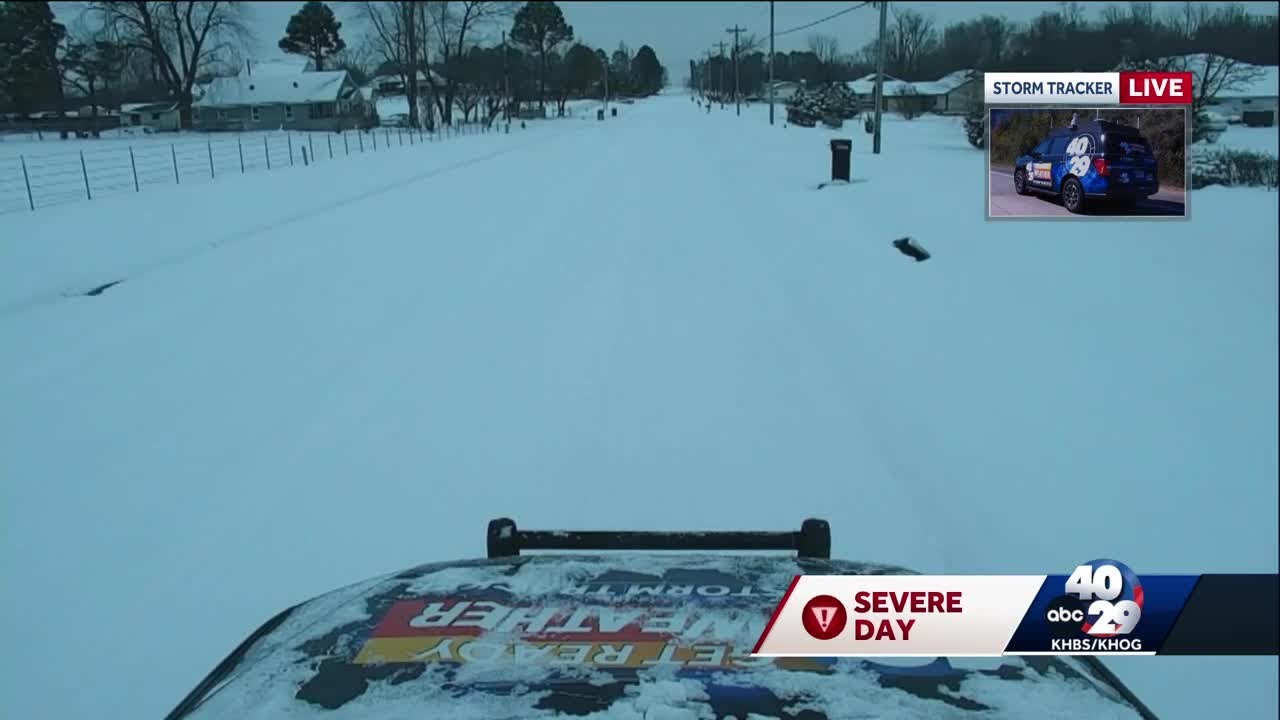 Secondary roads in Rogers covered in snow - YouTube