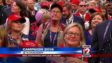 Republican National Convention attendees applaud Trump