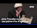 John Travolta reçoit une palme d'or d'honneur