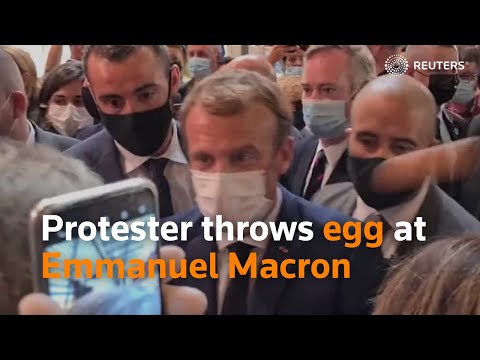 Protester throws egg at Emmanuel Macron, shouts 'Vive la revolution'