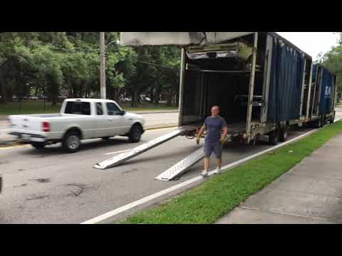 Unloading an SUV from an Enclosed Car Transport