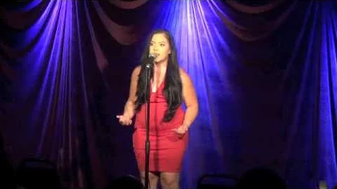 Deborah Kathy Santiago singing' Heaven on their mi...