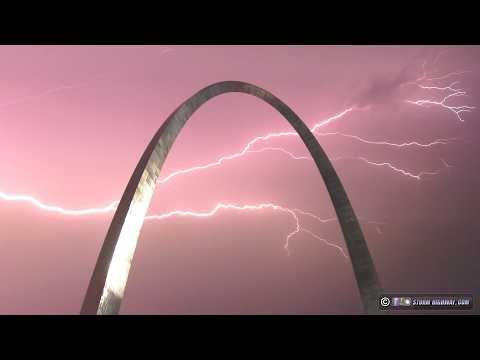 Lightning fills the sky behind the Gateway Arch during St. Louis storms
