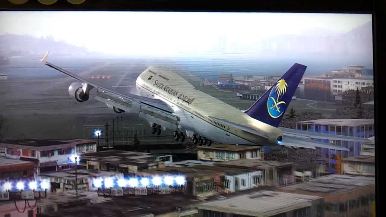 Playing Flight Simulator 2004 (Saudi Airlines landing at kai tak airport)