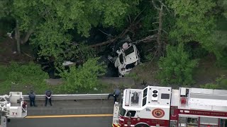 SUV rolls over, crashes into water in Route 3 crash