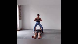 Acroyoga - Reverse Straddle Throne on Hands