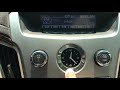 How to set the clock on a 2008 Cadillac CTS