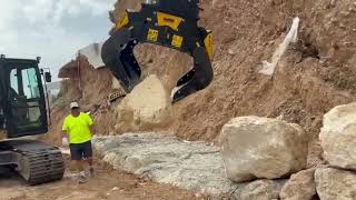 Moving Riprap in Valencia with the MB-G1000 Sorting Grapple on a CAT Excavator