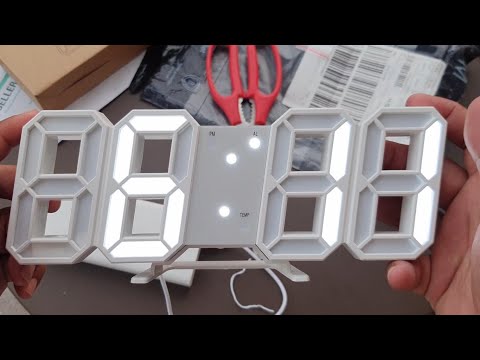 Video: Backlit Wall Relo: LED Digital Na Orasan, Kuminang Sa Dilim. Ang Mga Clock-lamp Na May Maliwanag Na Mga Numero At Arrow At Mga Kuwadro Na Gawa Sa Relo Sa Dingding, Iba Pang Mga Pag