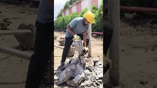 indian worker, electrical breaker work concrete
