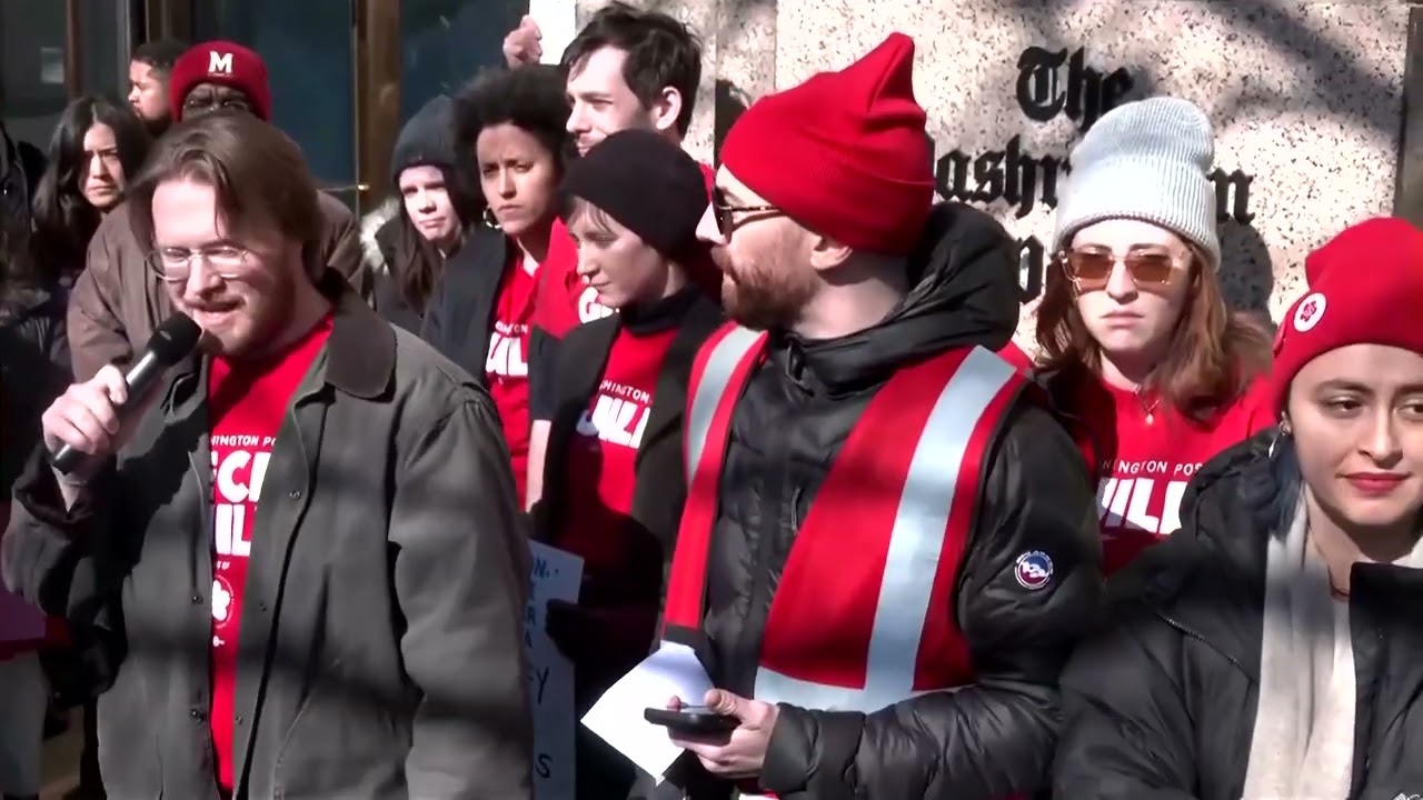 Protesters outside the Washington Post call layoffs 'shameful'