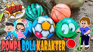 Pompa bola semangka, bola basket, bola sepak, bola bergambar. Lempar bola ke kolam ikan