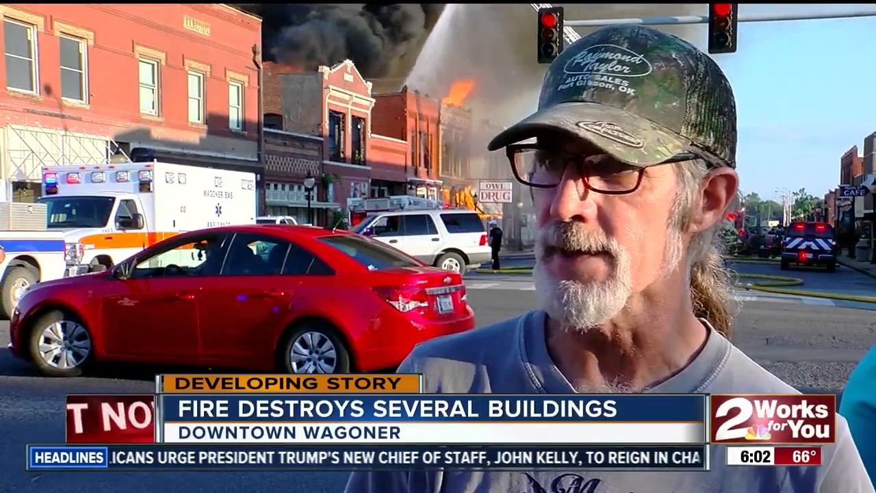 Buildings smoldering hours after a massive fire erupted in Wagoner