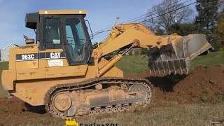 CAT 963C Track Loader Very Beginning Phase of Digging a Basement