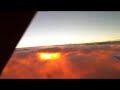 Sun rise under the clouds at fl280