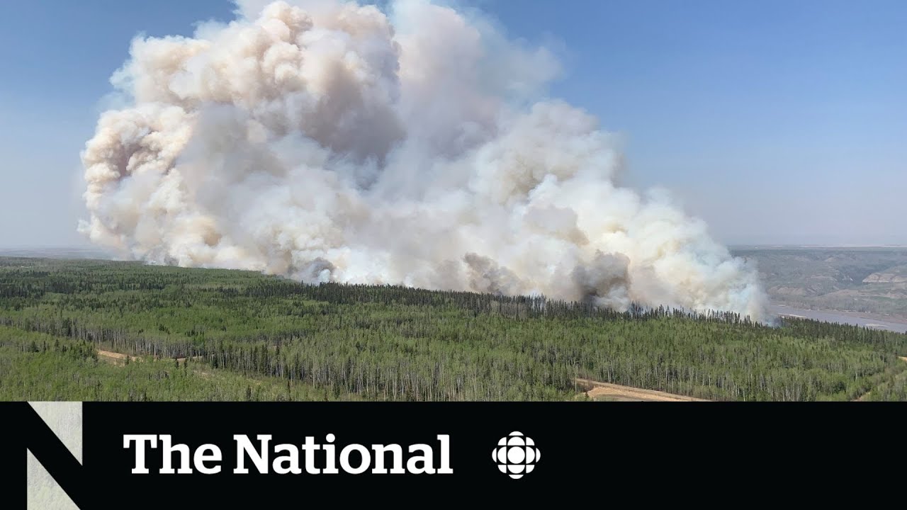 Alberta wildfires force thousands from their homes - YouTube