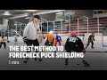 The best method to forecheck puck shielding