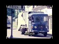 1970s UK, Rubbish Truck Driving Through Suburbs, 16mm