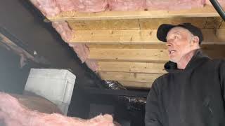 Re-insulating a double wide mobile home.