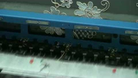 CORDING DEVICE INSTALLED ON A LAESSER L 120 15 YARDS SCHIFFLI EMBROIDERY MACHINE