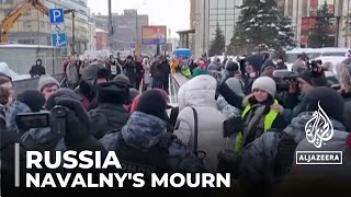 Dozens arrested as Russians mourn Navalny's death despite anti-dissident laws