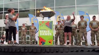 Dani Busboom Kelly lights the cauldron starting the 2025 Cornhusker State Games