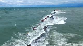 Waves batter Lake Michigan lighthouses