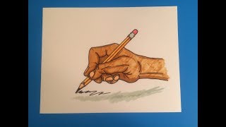 Hand holding pencil