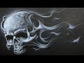 Airbrushing a skull with smoke flames