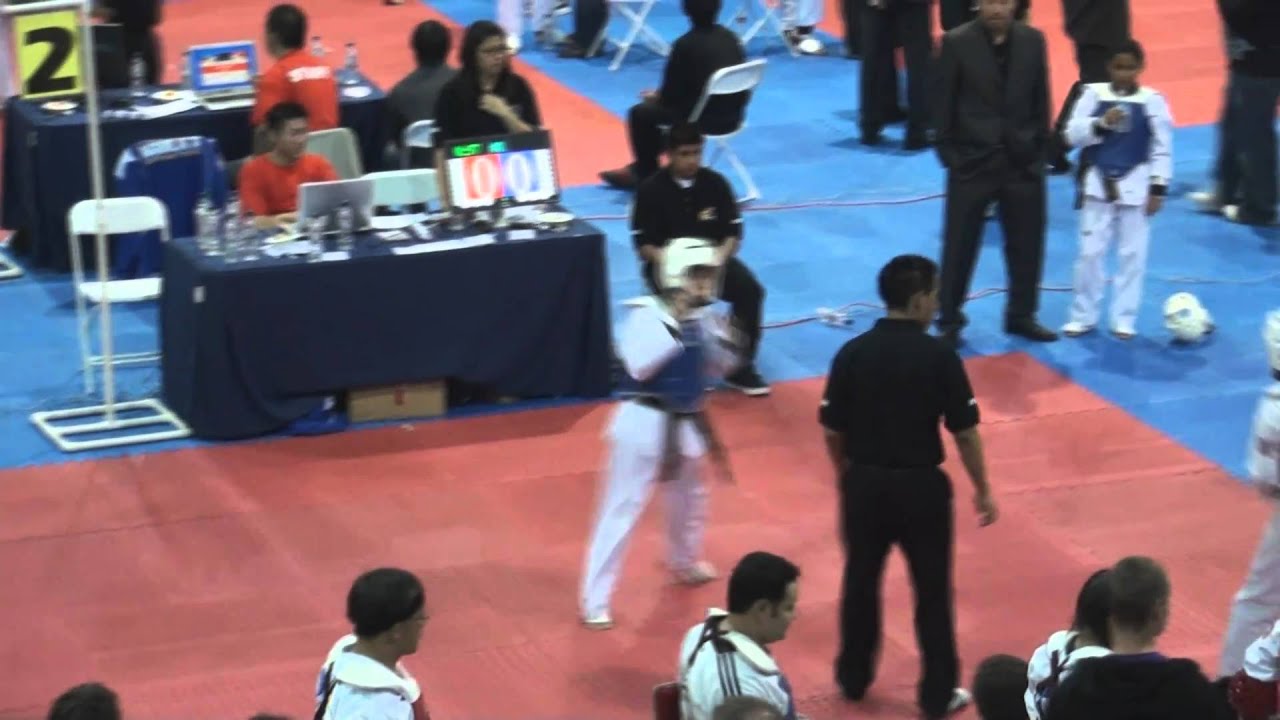 Young Kim Taekwondo 2010 December CA TKD United Andrew and Aaron Sparring