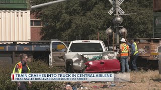 Train crashes into truck in central Abilene