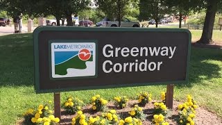 Police respond after a woman shot at Lake MetroParks on bike trail in Lake County