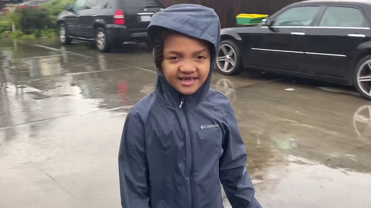Rainy Day Splashing in Puddles
