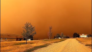 RED SMOKY SUNSETS: WHITE ROCK LAKE WILDFIRE. VIEW FROM VERNON, BRITISH COLUMBIA