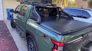 2025 Nissan Frontier pro-x modified tri fold tonneau cover to work with stock accessory roll bar 