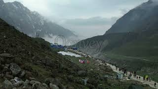 Kedarnath, India: Hindu Temple and pilgrimage aerial shot in clouds | Stock Video