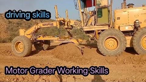 Exellent work by cat 140g grader operator leveling soil on a road-new road construction video