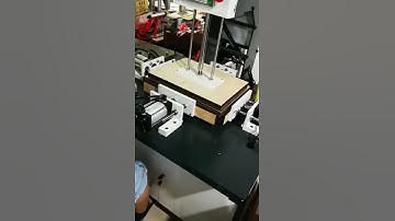 Rigid box pressing machine