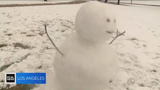 Rare snowfall in Yucaipa leads to closed schools and snow fun