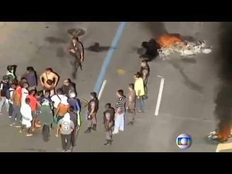 Buses torched in Rio favela protests