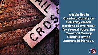 Train fire in Crawford County closes roads for several hours