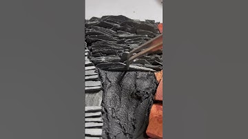 Watch me make a mosaic: setting pieces of slate, stone and glass into a bed of thinset. #shorts #art