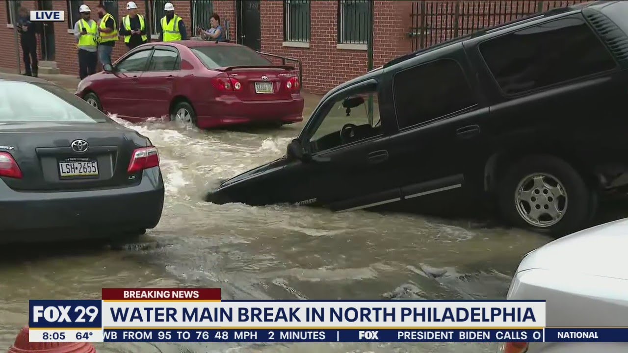Truck submerged in sinkhole as crews respond to water main break in ...