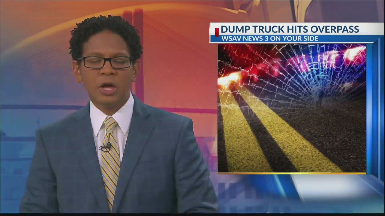 Dump truck hits overpass on Veterans Parkway - YouTube