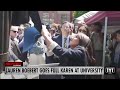 Lauren boebert goes full karen tries to rip down flag on campus ind