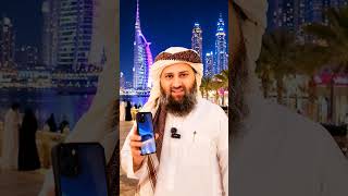 showing tall buildings, beautiful skyline, luxury atmosphere, and colorful city lights in the backgr